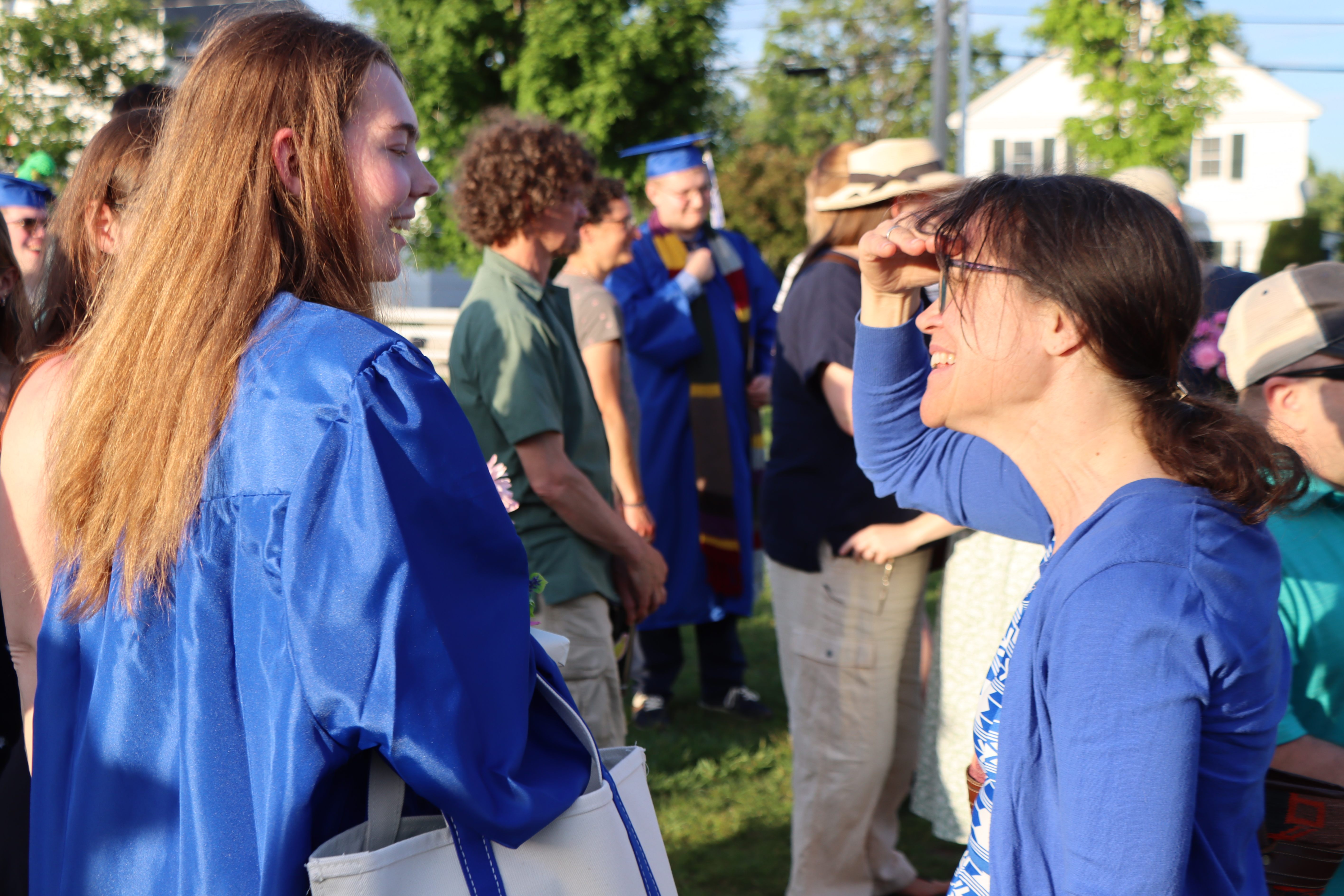 graduate with teacher