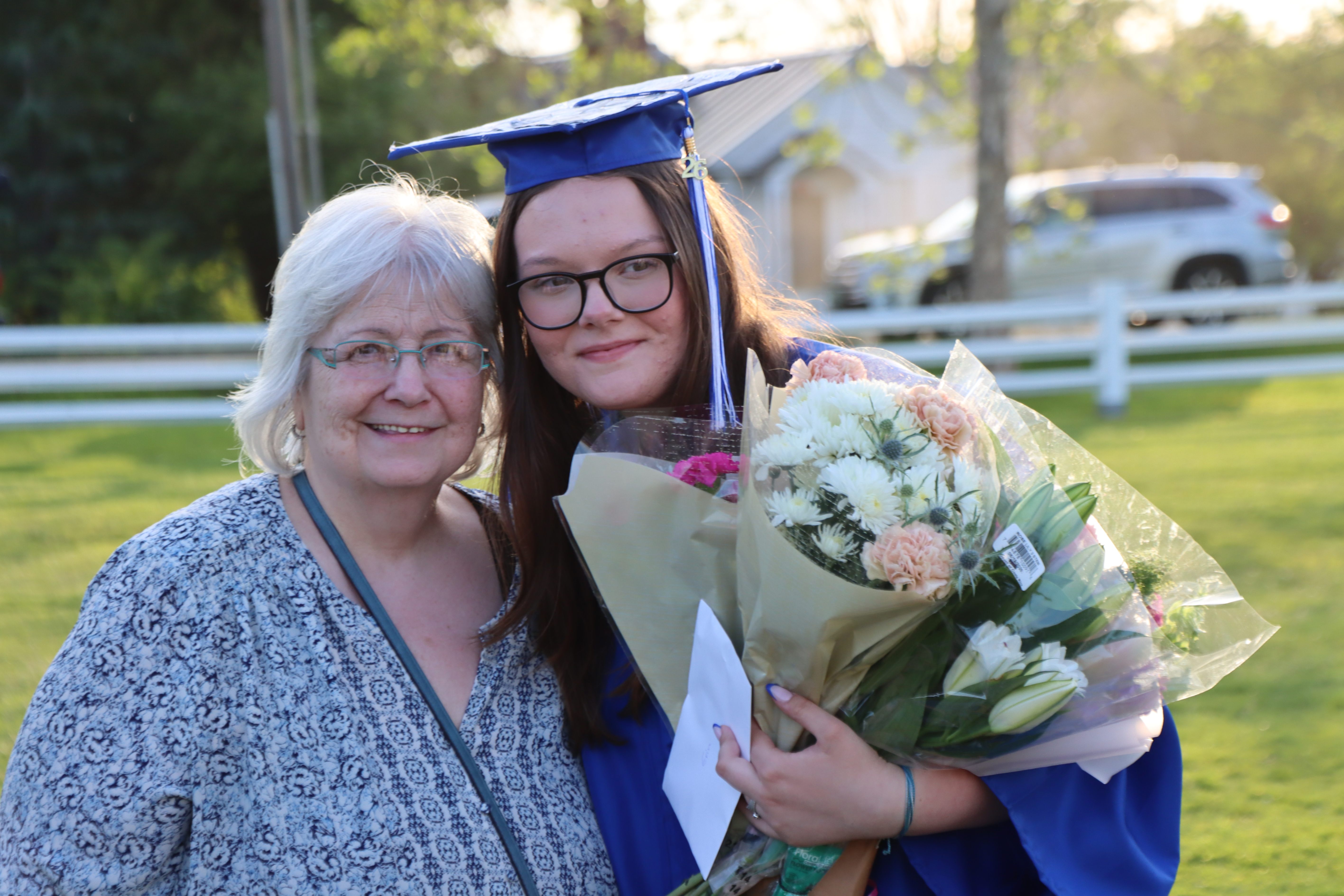 graduate with family