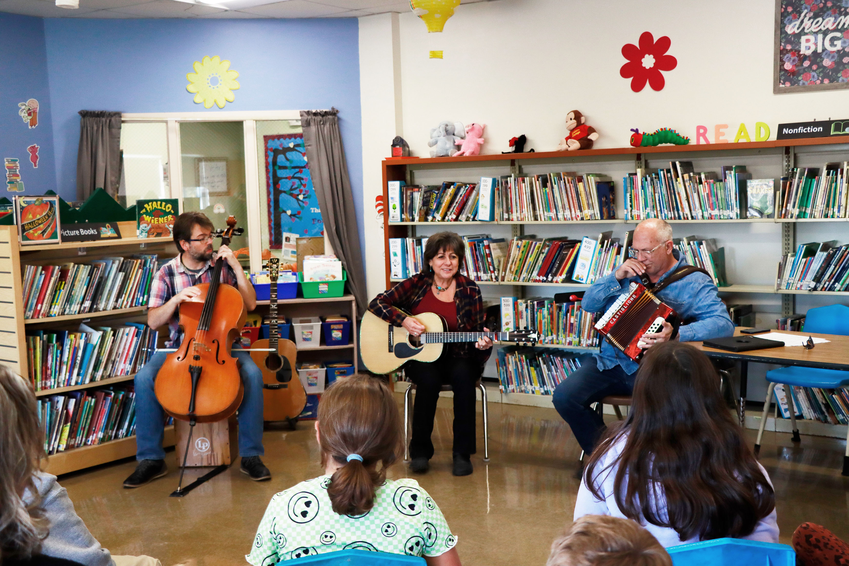 cellist, guitarist/singer and accordianist