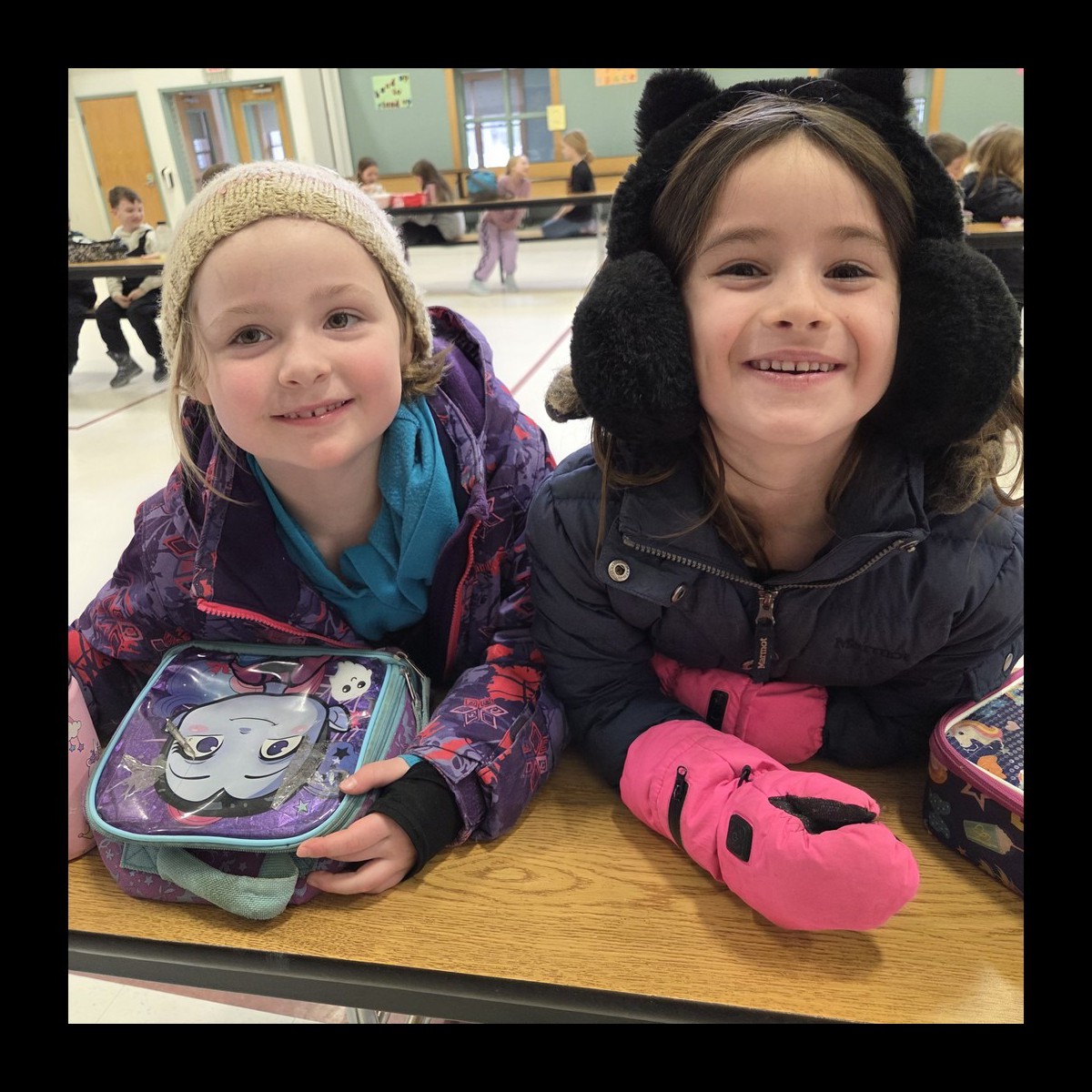 students eating lunch in winter clothes